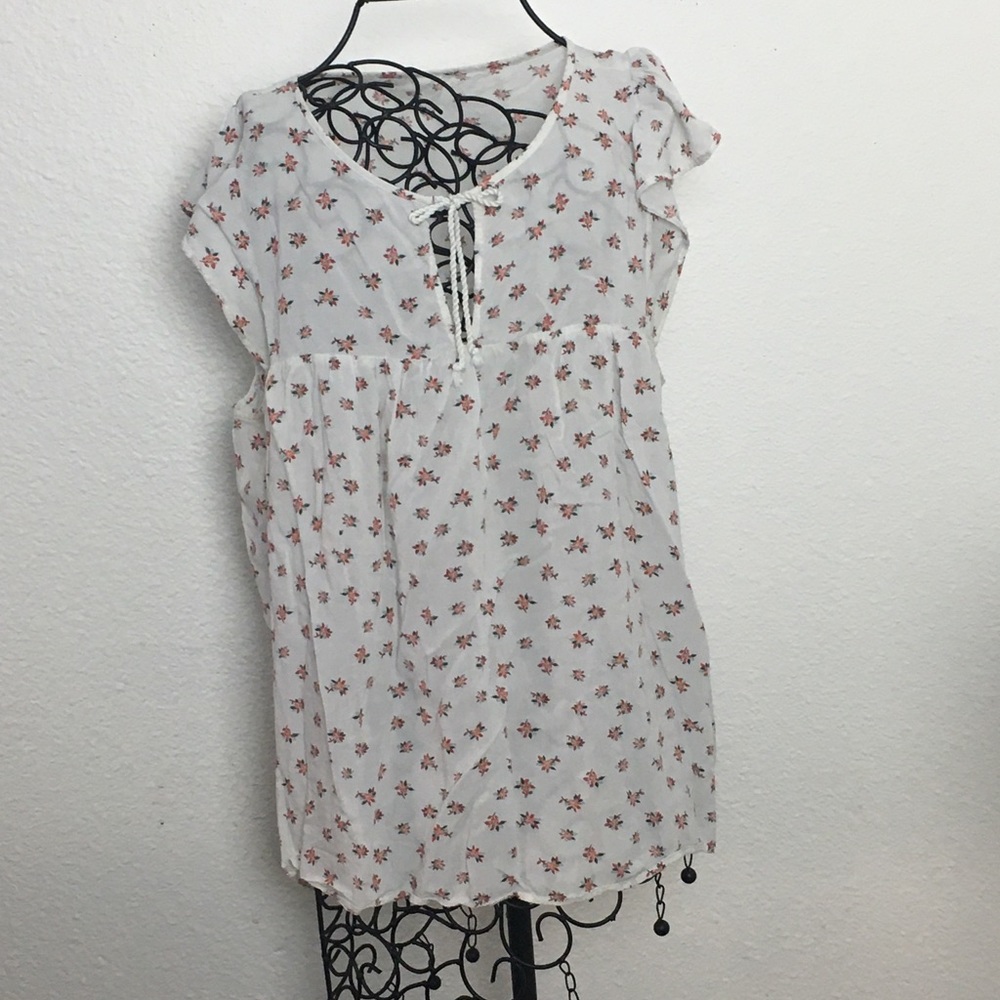 Floral white blouse.